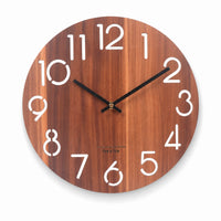 Éclaircie — Horloge Murale Bois Ajourée Chiffres Romains