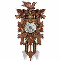 Forêt-Noire, horloge coucou murale en bois sculpté, vue principale du cadran, Côté Horloge