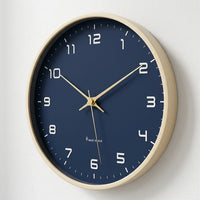 Horloge murale design marine Lagom Marine de Côté Horloge, avec un motif marin élégant et moderne.